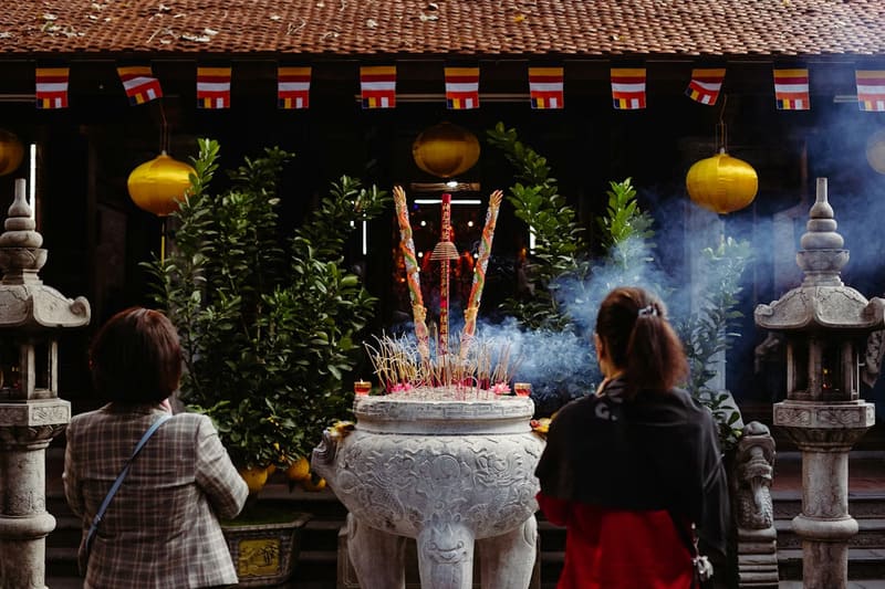 People praying at a temple