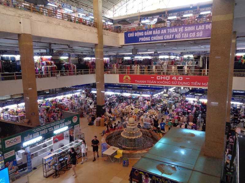The bustling interior of Dong Xuan Market