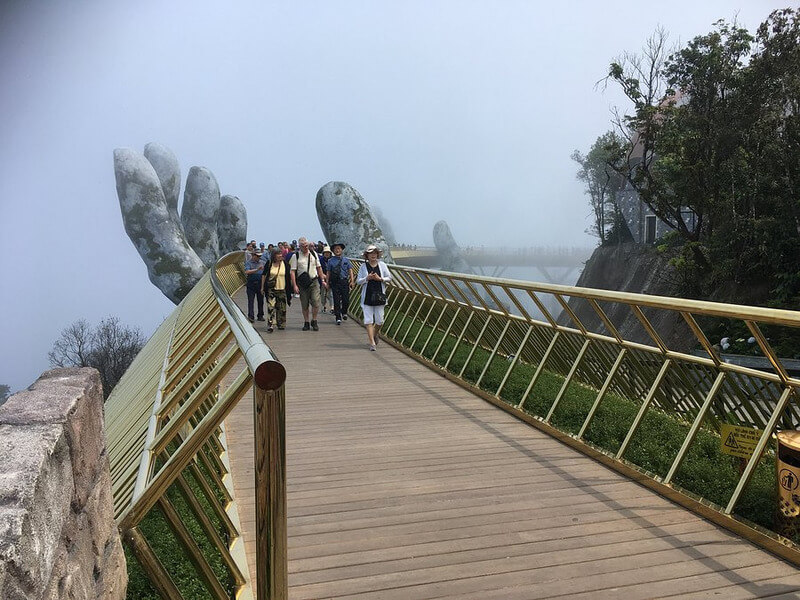 Guests walking along the Golden Bridge